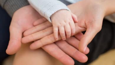 усиновлення