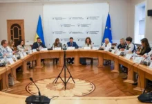 Дмитро Лубінець під час виступу на платформі щодо торгівлі людьми